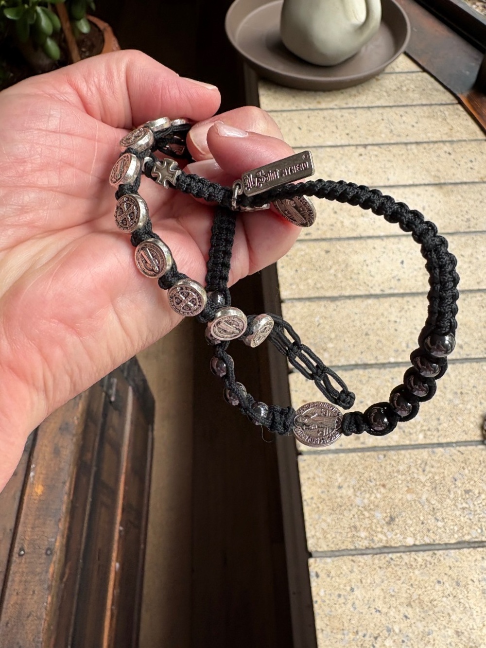 Black woven cord necklace and bracelet set -silver tone Saint medals.